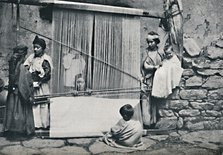 Kabyle weavers and native loom, Northern Algeria, 1912. Artist: Legrand.