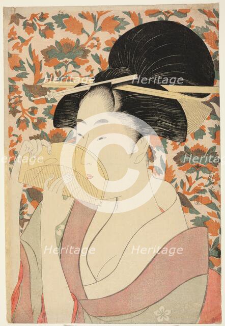 Woman Holding a Tortoise-shell Hair-comb, Japan, c. 1795/96. Creator: Kitagawa Utamaro.