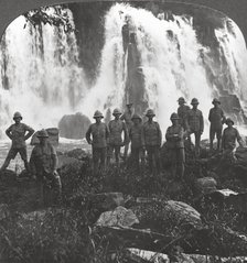 British troops refreshing themselves at a waterfall, Africa, World War I, c1914-c1918. Artist: Realistic Travels Publishers