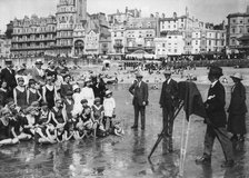 Photographer taking a seaside snap, c1900-1919(?). Artist: Unknown