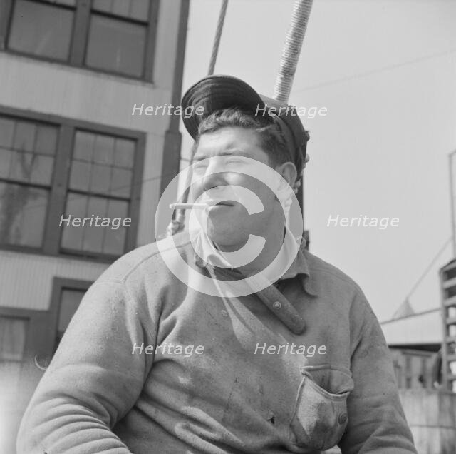 A Fulton fish market stevedore, New York, 1943. Creator: Gordon Parks.