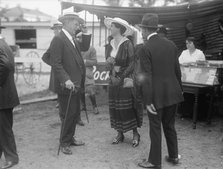 Horse Shows - Judge Moore And Mrs. Hitt, 1916. Creator: Harris & Ewing.