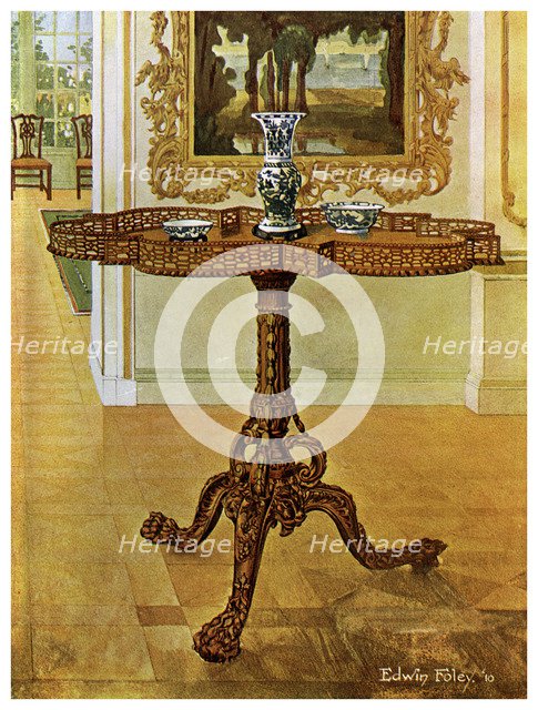 Shaped fret rimmed gallery table, Chippendale School, 1911-1912.Artist: Edwin Foley