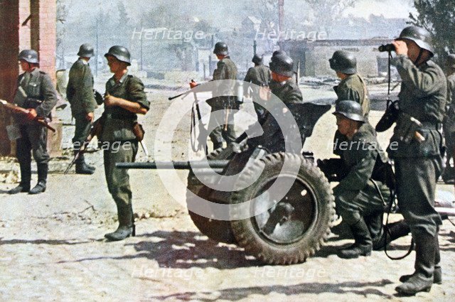 German infantrymen with light field artillery, Russia, 1943. Artist: Unknown