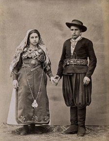 People of Leon, a man and woman holding hands, wearing traditional dress, c1880. Creator: Juan Laurent.