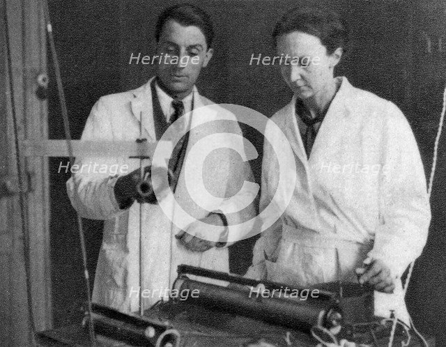 Frederic Joliot and Irene Joliot-Curie, French scientists, 1935. Artist: Unknown