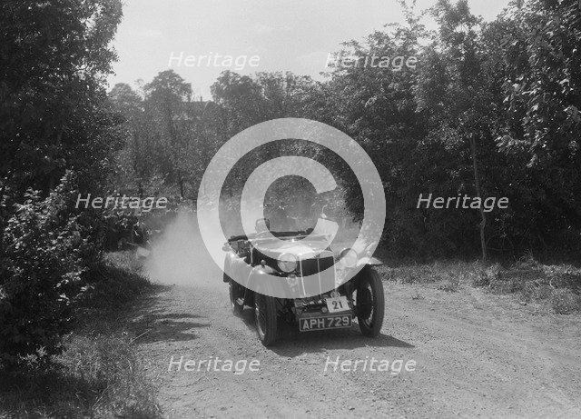 MG Magna of K Bear competing in the BOC Hill Climb, Chalfont St Peter, Buckinghamshire, 1932. Artist: Bill Brunell.