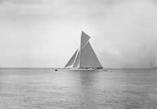The 19-metre cutter 'Norada' sailing in gentle winds, 1911. Creator: Kirk & Sons of Cowes.