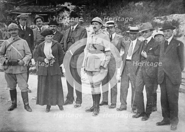 Rheims - American War Correspondents: French Officer; Mrs. Harriet C. Adams; Paul Cravath..., 1916. Creator: Harris & Ewing.