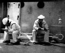The Spanish-American War: American naval and military types - reading letters in a quiet spot, 1898. Creator: Unknown.