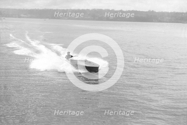Power boat under way, 1914. Creator: Kirk & Sons of Cowes.