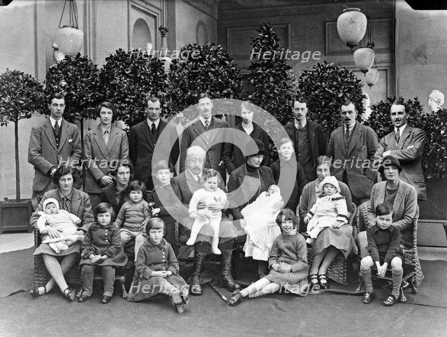 The 9th Duke of Devonshire with his children and grandchildren at Chatsworth, Christmas 1925. Artist: JR Board