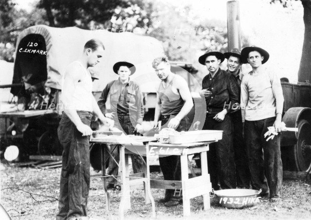 Troops of the 61st Cavalry Artillery preparing food on a hike, Illinois, USA, 1932. Artist: Ekmark Photo