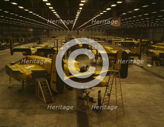 Assembling B-25 bombers at North American Aviation, Kansas City, Kansas, 1942. Creator: Alfred T Palmer.