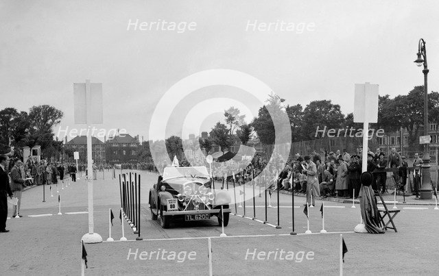 Rover 12/4 of WP Maidens competing in the South Wales Auto Club Welsh Rally, 1937 Artist: Bill Brunell.