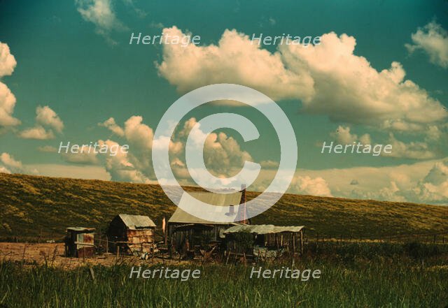 Negro tenant's home beside the Mississippi River levee, near Lake Providence, La., 1940. Creator: Marion Post Wolcott.