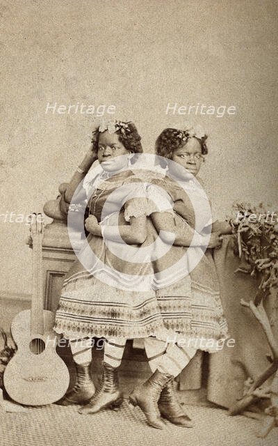The Millie-Christine sisters, conjoined twins, standing, c1871. Creator: Unknown.