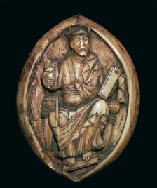 Anglo-Saxon carving of a man writing a book, 10th century. Artist: Unknown