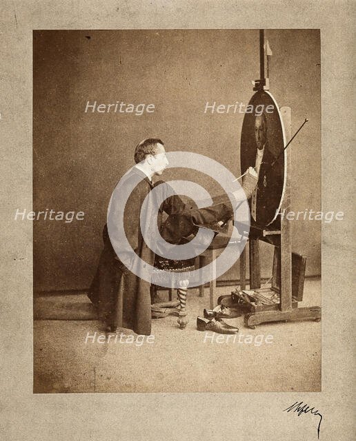 A man painting an oval portrait using his feet, c1870. Creator: Joseph Dupont.