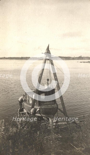 Repair of the boat "Mana" on the banks of the Zeya River, 1909. Creator: Vladimir Ivanovich Fedorov.