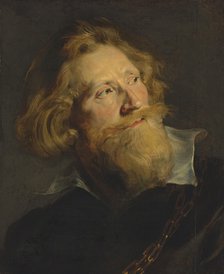 Portrait of a bearded man with a white collar and gold chains.