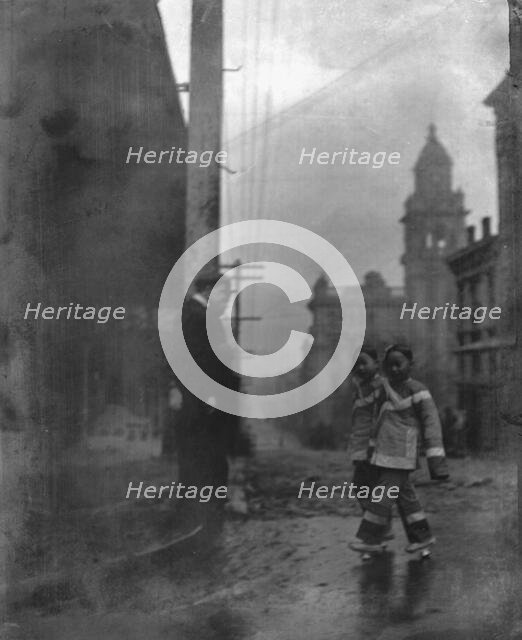 Two little maids from school, Chinatown, San Francisco, between 1896 and 1906. Creator: Arnold Genthe.