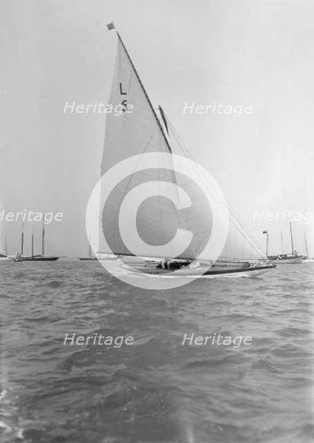 Capt R J Dixon winning the 6 Metre race in 'Jonquil'. Creator: Kirk & Sons of Cowes.