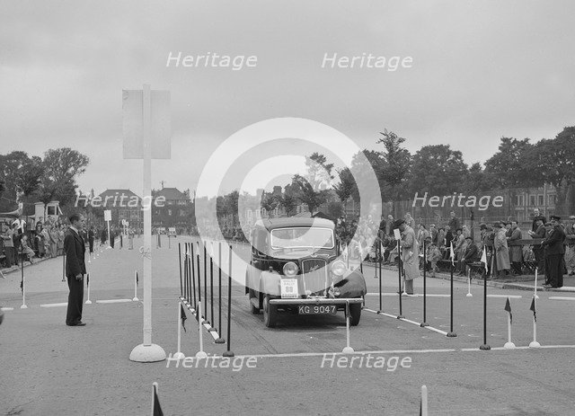 Austin Cambridge saloon of A Howell competing in the South Wales Auto Club Welsh Rally, 1937 Artist: Bill Brunell.