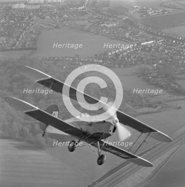 Stampe biplane in flight, 20th century. Artist: Aerofilms.