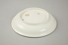 White dish with anhua design of two phoenix and cloud scroll design, Song dynasty, c.1300. Artist: Unknown.