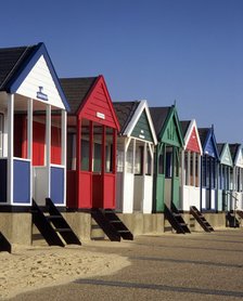 A row of eight colourful beach huts, Southwold, Suffolk, c2000s(?).  Artist: Unknown.