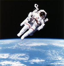 US Astronaut Bruce McCandless spacewalking, 1984. Artist: Unknown