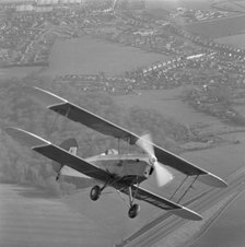 Stampe biplane in flight, 20th century. Artist: Aerofilms.