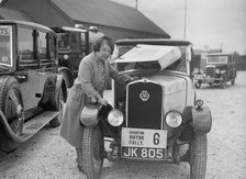 Mrs JW McClintock with her Triumph saloon at the B&HMC Brighton Motor Rally, 1930. Artist: Bill Brunell.