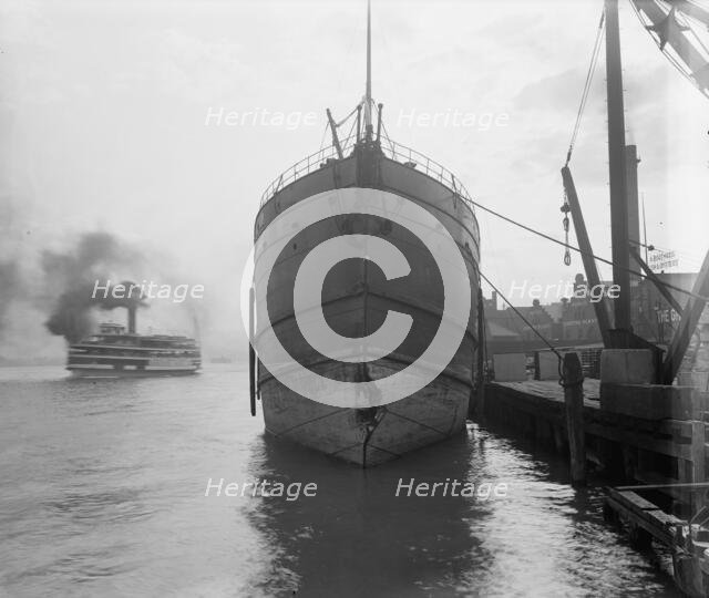Unidentified freighter, Detroit, Michigan, with passenger steamer Britannia..., c1906-1915. Creator: Unknown.