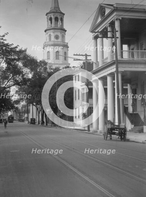 View down street to St. Michael's Church, Charleston, South Carolina, between 1920 and 1926. Creator: Arnold Genthe.