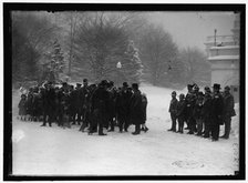 Group outside White House in snow, between 1913 and 1918. Creator: Harris & Ewing.