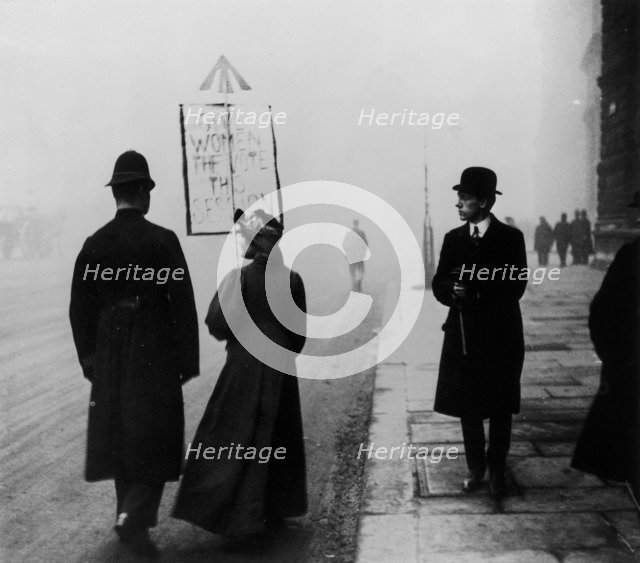 A suffragette demonstrating in Whitehall, London, c1908. Artist: Unknown