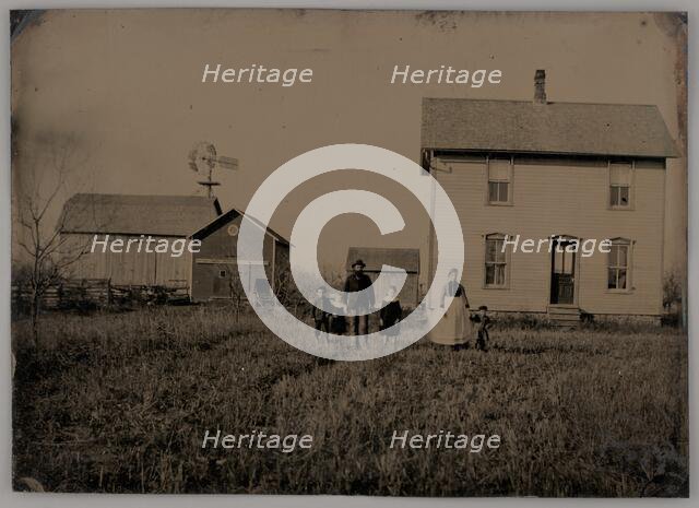 Untitled (A Man, a Woman, and Three Children Standing in Front of a Farmhouse), 1875. Creator: Unknown.