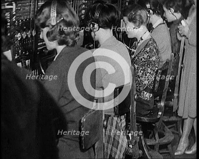 Female Civilians Working at the International Telephone Exchange, 1931. Creator: British Pathe Ltd.