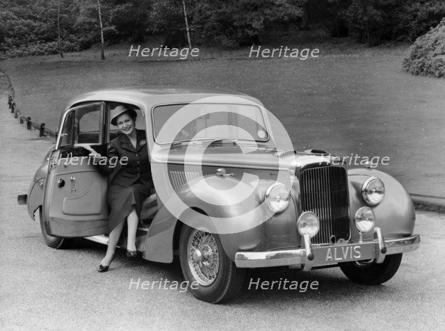 Woman in a 1954 Alvis 3 litre TC 21, (late 1950s?). Artist: Unknown