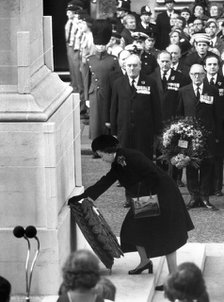 The Queen laying a wreath at the Cenotaph, Remembrance Day Parade, Whitehall, London, 1980. Artist: Unknown