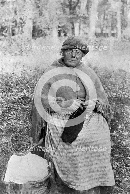 Beti Ty Mwd in front of Glynllifon House Lodge, c1920. Creator: Unknown.