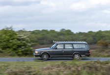 Volvo 244 Estate driving in New Forest, 2012. Creator: Tim Woodcock.