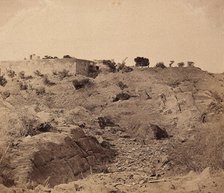 India: the ruins of Sammy House surrounded by scattered bones of sepoys killed in action, c1858. Creator: Felice Beato.