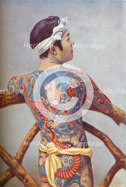 An elaborately tattooed Japanese man, 1902. Artist: Unknown.