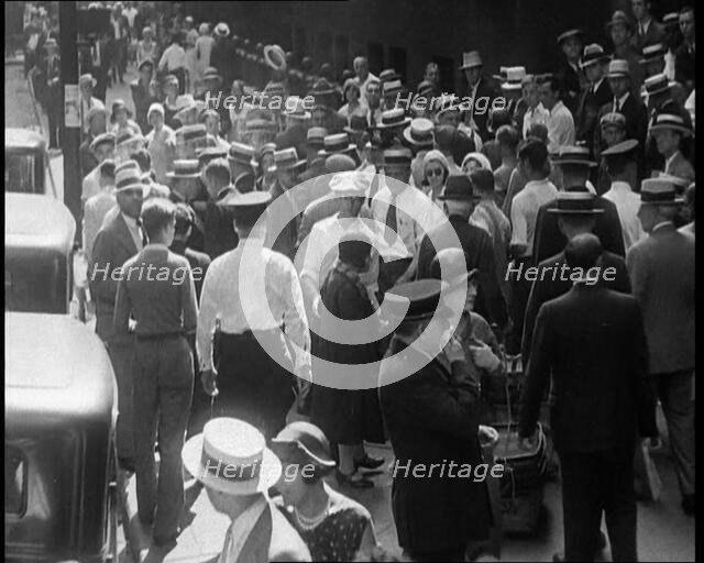 American Civilians Walking down the Streets of New York City, 1930. Creator: British Pathe Ltd.