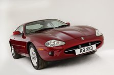 1999 Jaguar XK8 coupe Artist: Unknown.