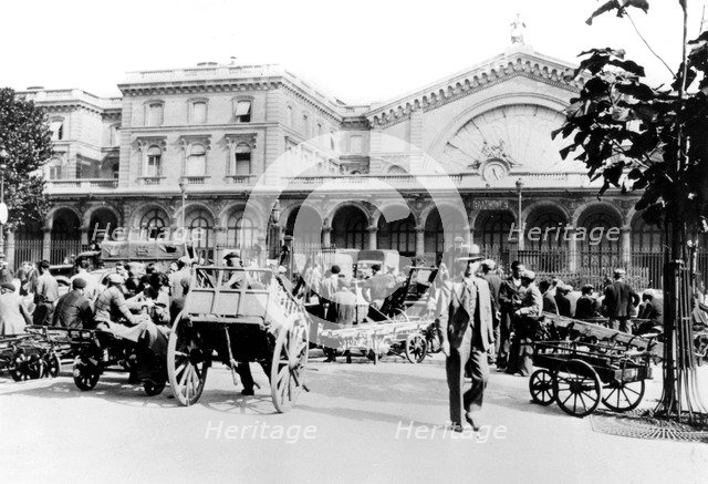 Outside the Gare de l'Est, German-occupied Paris, September 1940. Artist: Unknown