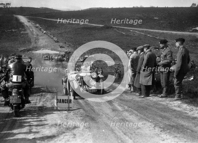 1934 MG PA competing in a motoring trial, Bagshot Heath, Surrey, 1930s. Artist: Bill Brunell.